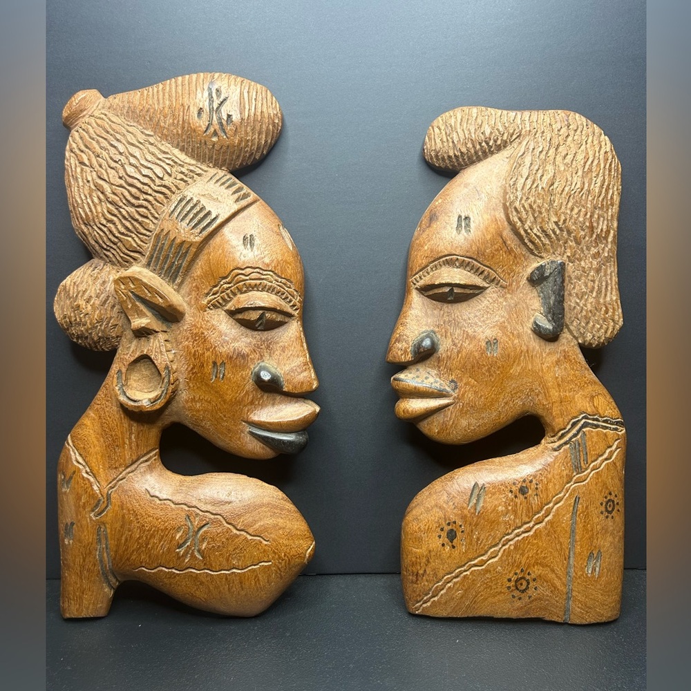 African Tribal wood carvings - man & woman wall decor

Approx 18" tall x 8.5"